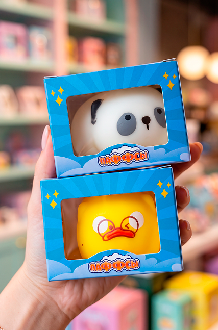 Игрушки в коробочках с окошком